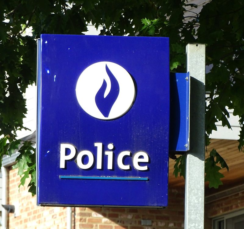 blue and white no smoking sign